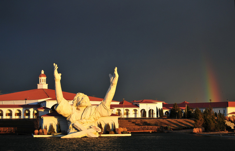 King of Kings Statue with rainbow.